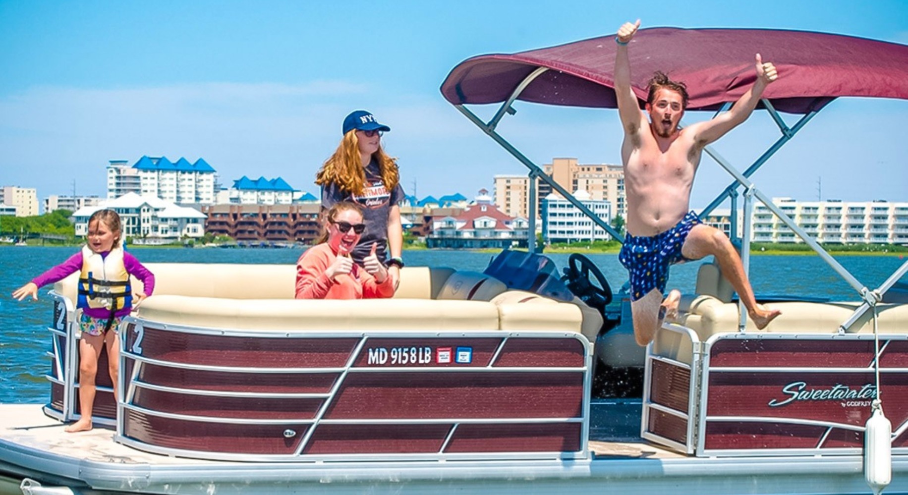 a person riding on the back of a boat