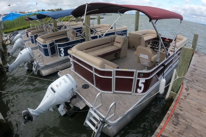 a boat parked on the beach